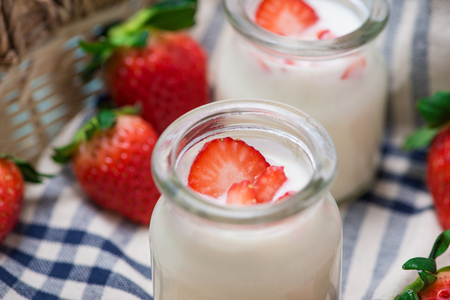Strawberry Yoghurt. Healthy food with Strawberries and yoghurt breakfast on table.の写真素材