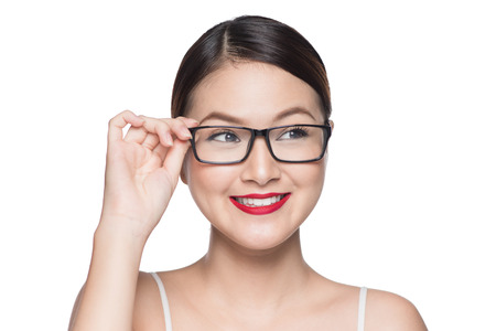 Beauty asian model girl with perfect skin wearing glasses, isolated on white background.の写真素材
