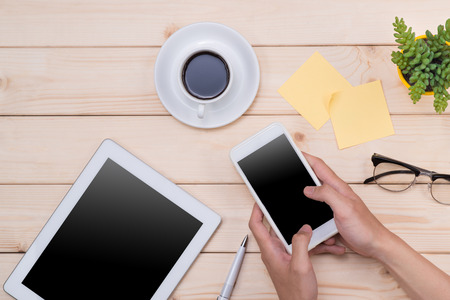 Tablet header image. Office stuff, workplace, top viewの写真素材