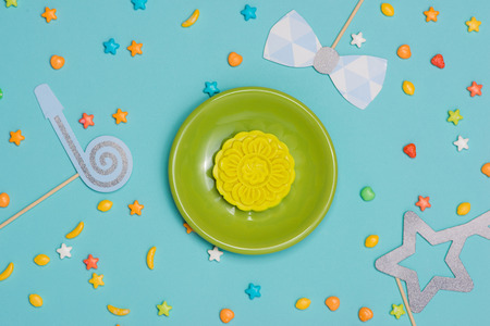 Table party setting. Traditional mid autumn festival colorful mooncakes.の写真素材