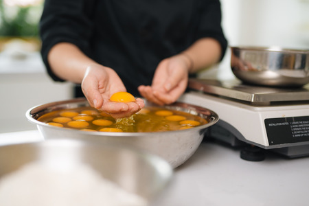 Bakery chef cooking bake in the kitchen professionalの写真素材
