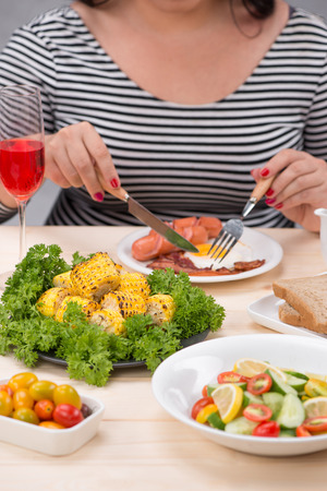 Cropped image of asian woman have breakfastの写真素材