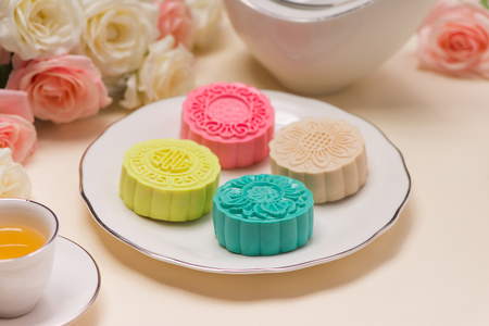 Asian, Japanian food, Traditional sweet dessert multicolored no bake snow skin mooncakes on white marble table. copy space top viewの写真素材