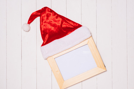 Christmas presents in decorative boxes on white wooden table backgroundの写真素材