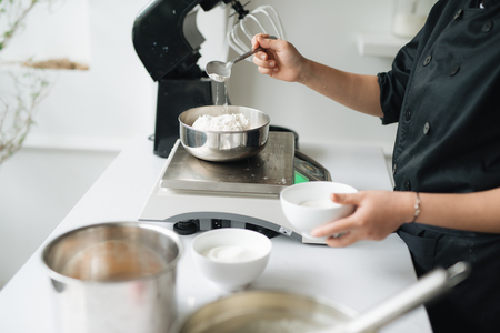 Bakery chef cooking bake in the kitchen professionalの写真素材
