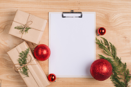 Christmas letter and wrapping christmas gifts. Top view with copy spaceの写真素材
