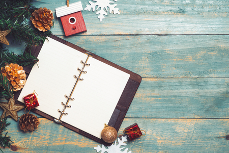 Christmas background with decorations on wooden background. Top view with copy spaceの写真素材