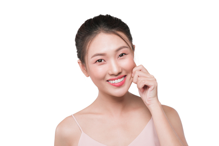 Young asian woman with clean fresh skin, antiaging conceptの写真素材
