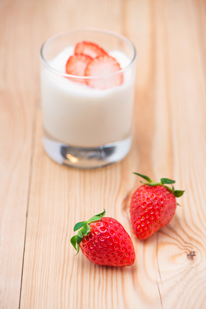 Strawberry Yoghurt. Healthy food with Strawberries and yoghurt breakfast on table.の写真素材