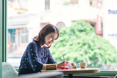 Asia business woman working  planning concept in a cafe.の写真素材