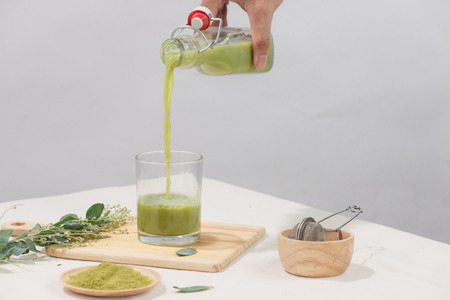 homemade green tea, refreshing for health on white backgroundの写真素材
