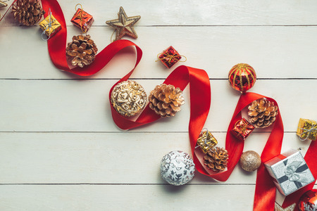 Christmas background with decorations on wooden background. Top view with copy spaceの写真素材