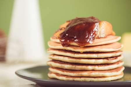 Pancakes with apple on table. Breakfast, snacks. Pancakes Day.の写真素材