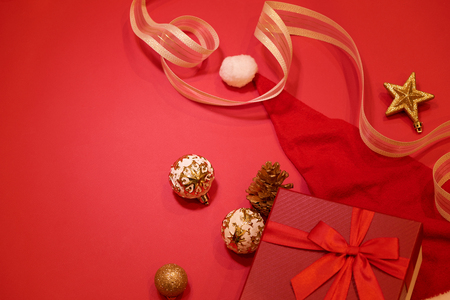 Christmas holidays composition on red background with copy space.の写真素材