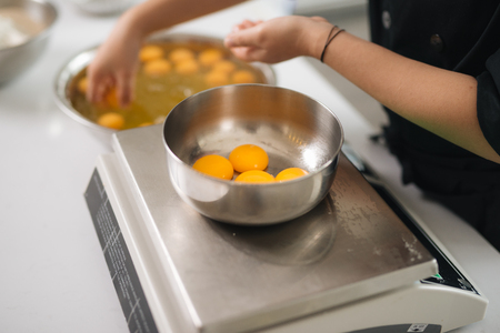 Bakery chef cooking bake in the kitchen professionalの写真素材