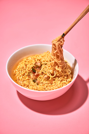 Traditional Asian instant noodles meal with vegetablesの写真素材