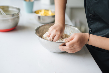 Bakery chef cooking bake in the kitchen professionalの写真素材