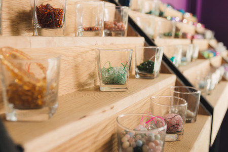 Many different natural stones in jewellery store の写真素材