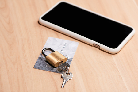 Credit cards on the keyboard with lock close upの写真素材