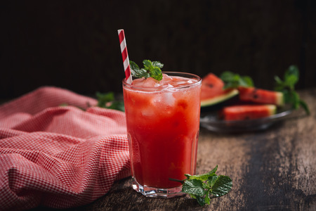 Refreshing summer watermelon in glasses with slices of watermelonの写真素材