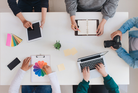 Young creative team having a meeting in creative office - teamwork concepts.の写真素材
