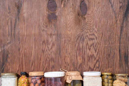 Food donations on wooden background, top view
