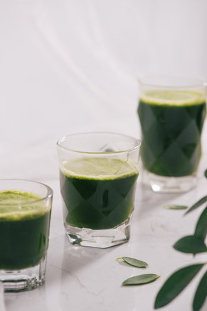 Healthy green smoothie. Natural, organic healthy juice in bottle for weight loss dietの写真素材