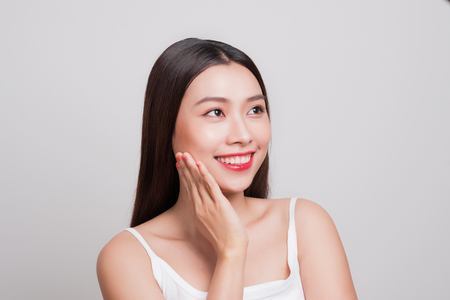 Portrait of a beautiful young woman with clean skinの写真素材