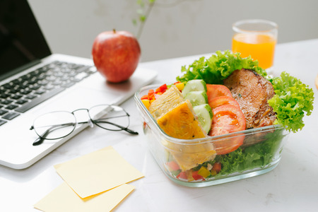 Food in the office. Healthy lunch for work.