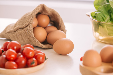 Kitchen Still Life.Fresh eggs in a Sack bag.の写真素材
