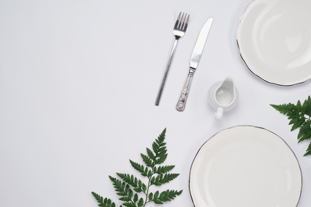 Ceramic plates on white background. Top view.