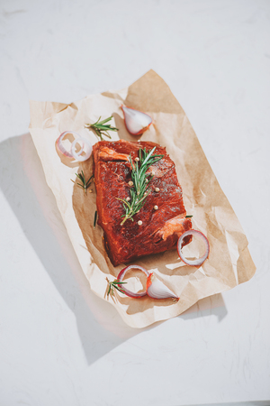 Raw fresh beef on white stone background, top viewの写真素材