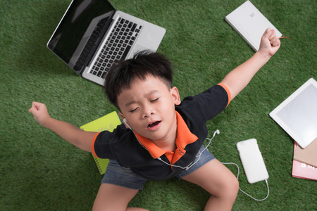 Waking little boy on natureの写真素材