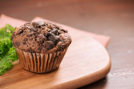 Dellicious homemade chocolate muffin on table. Ready to eat.の写真素材