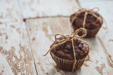 Dellicious homemade chocolate muffin on table. Ready to eat.の写真素材
