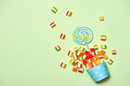 Birthday Concept - Holiday Top View Various Sweet Candy on White Background. Fun Decoration. Minimal Holiday Concept. Flat Layの写真素材