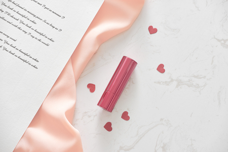Happy Valentine's Day concept on vintage paper sheet with lipstickの写真素材
