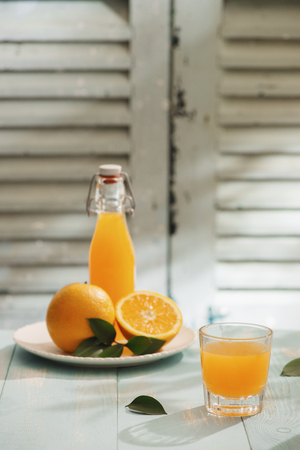 Oranges isolated cut set on wooden baseの写真素材