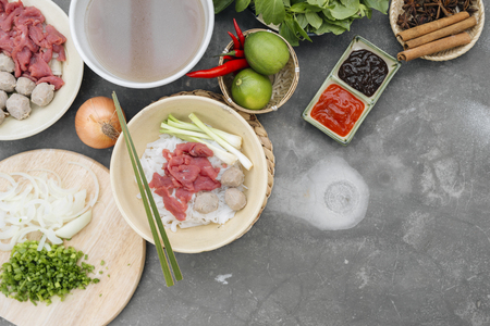 Assorted asian dinner with vietnamese noodle soup pho bo,の写真素材