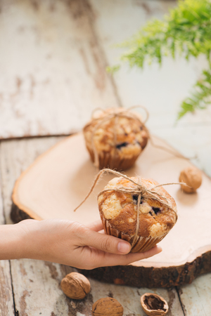 Dellicious homemade nut muffins on table. Sweet pastriesの写真素材