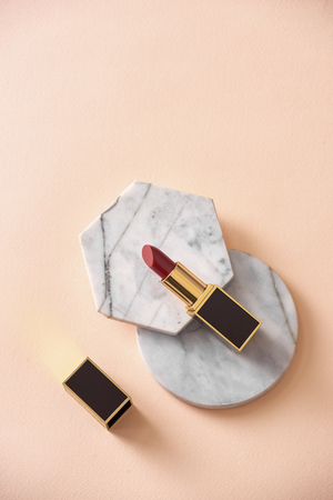 Red matte lipstick style on pastel isolated backgroundの写真素材