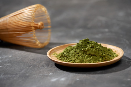 Organic Green Matcha Tea on wooden table, copyspaceの写真素材