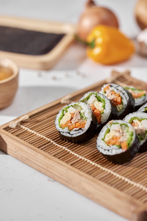 Korean roll Gimbap(kimbob) made from steamed white rice (bap) and various other ingredientsの写真素材