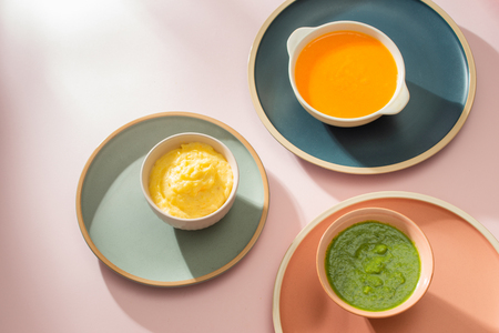 Homemade vegetable baby food purees in glass jarsの写真素材