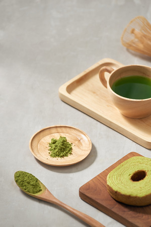 Green matcha Baumkuchen Japanese roll cakes with matcha, selective focusの写真素材