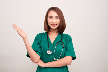 Nurse in uniform with stethoscope isolated on white backgroundの写真素材
