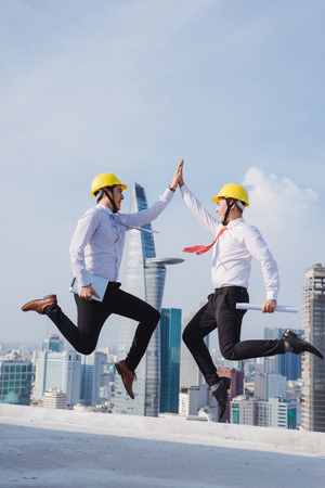 Team engineer jumping when their project is success.の写真素材