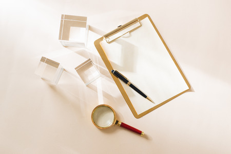White Desktop. Mock up product view table gold accessories. stationery supplies. glamour style. Gold staplerの写真素材