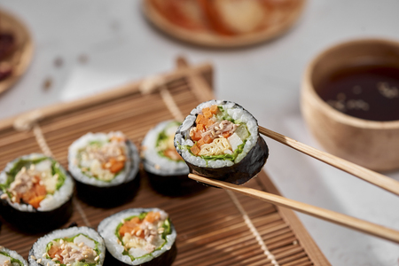 Korean roll Gimbap(kimbob) made from steamed white rice (bap) and various other ingredientsの写真素材