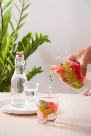 infused water of watermelon on white backgroundの写真素材